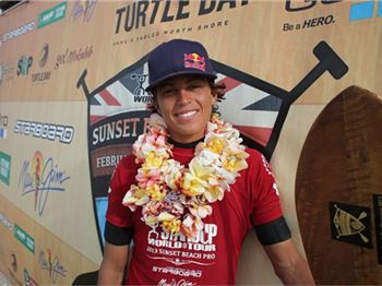 Sun sets over Kai lenny on the podium at the Stand Up Worlds - Stand Up Paddle News